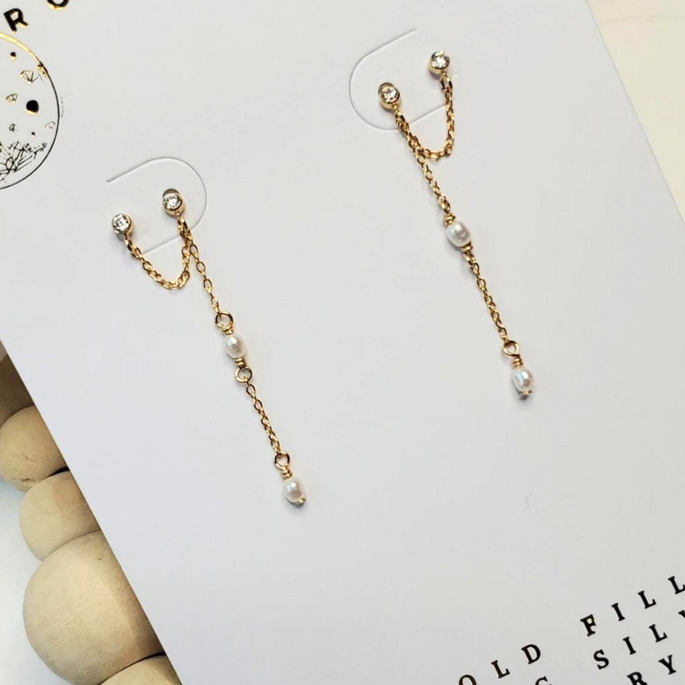 
            
                Load image into Gallery viewer, Double Stud Chain Earrings |  14k Gold Fill | CZ Stone | Freshwater Pearl
            
        